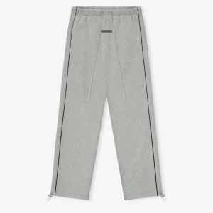 Pantalones deportivos holgados Essentials en negro jaspeado y hormigón